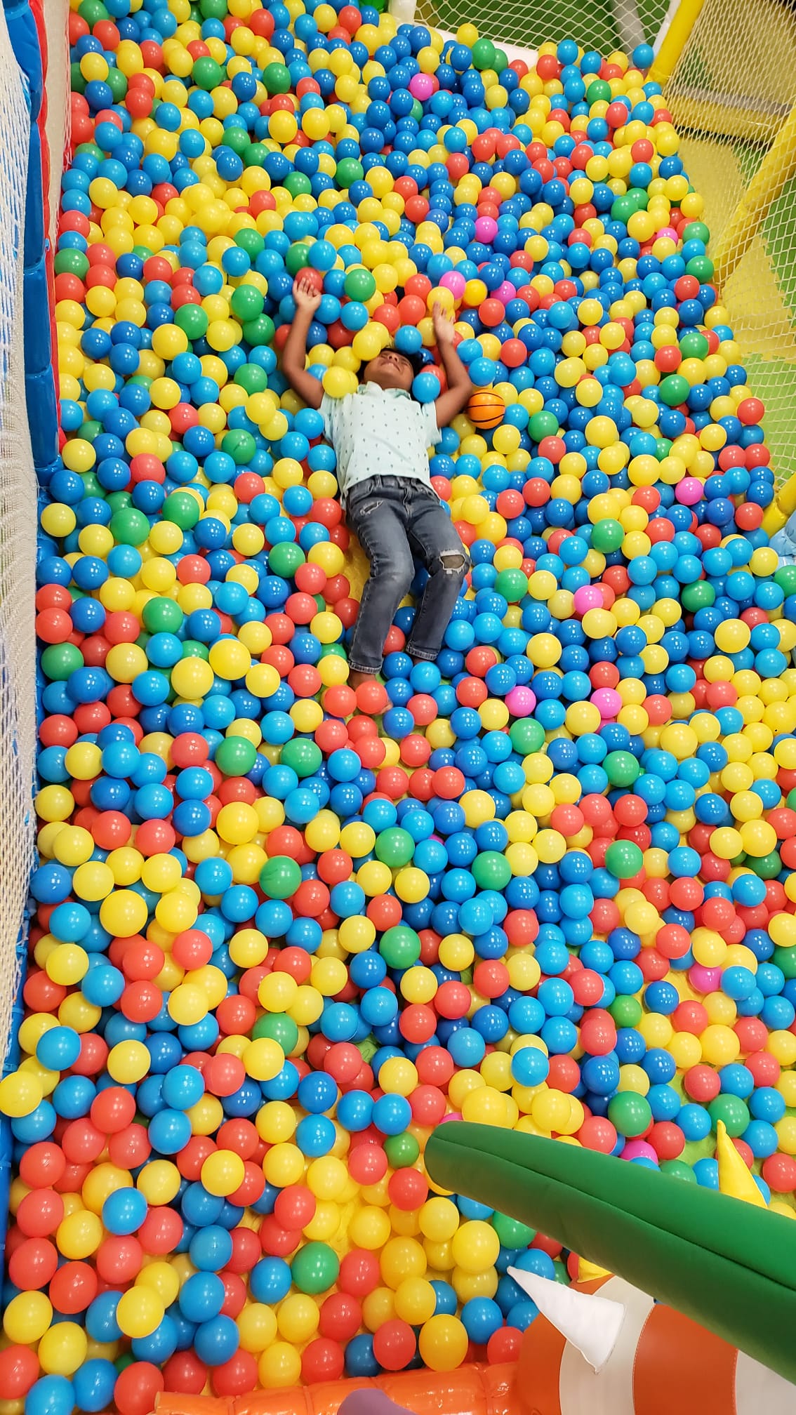 Child in the ball pit